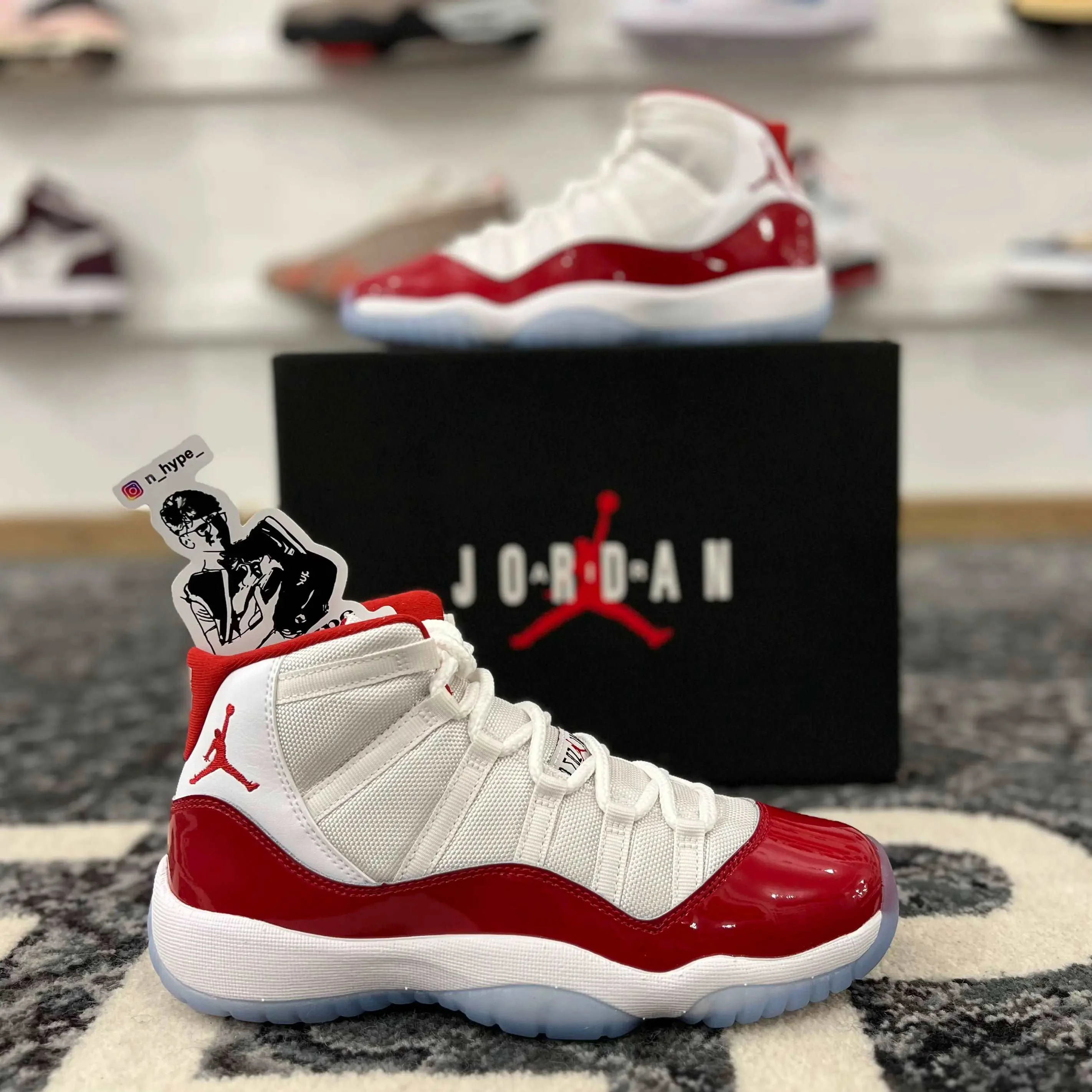 Jordan 11 Retro Cherry (2022) (GS) - Image 2