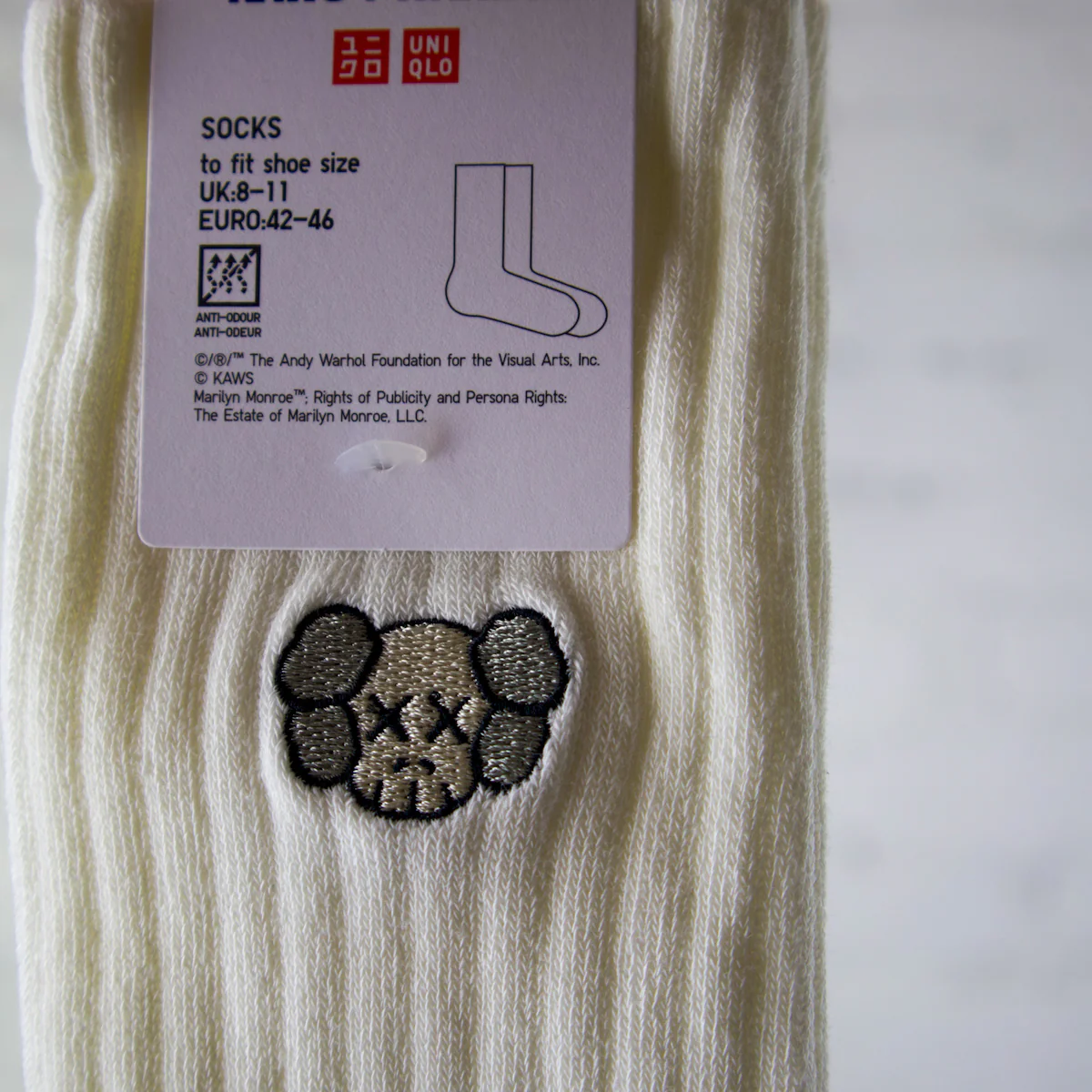 KAWS Uniqlo x Andy Warhol Skull and Bones Socks White - Image 2