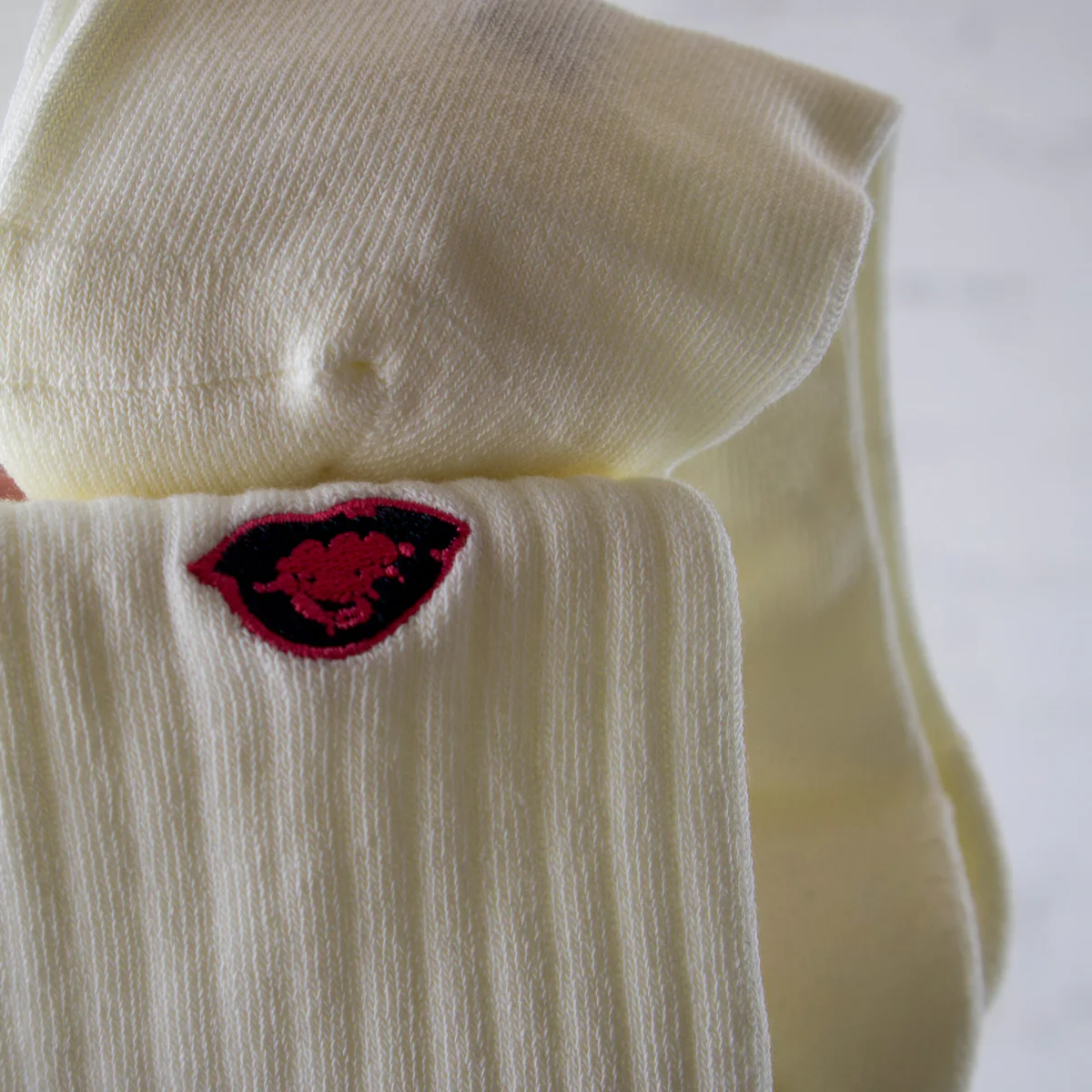 KAWS Uniqlo x Andy Warhol Skull and Bones Socks White - Image 3